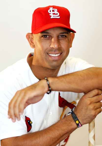 Alex Cora Alex Cora #13 of the St. Louis Cardinals poses during photo day at Roger Dean Stadium on February 29, 2012 in Jupiter, Florida.